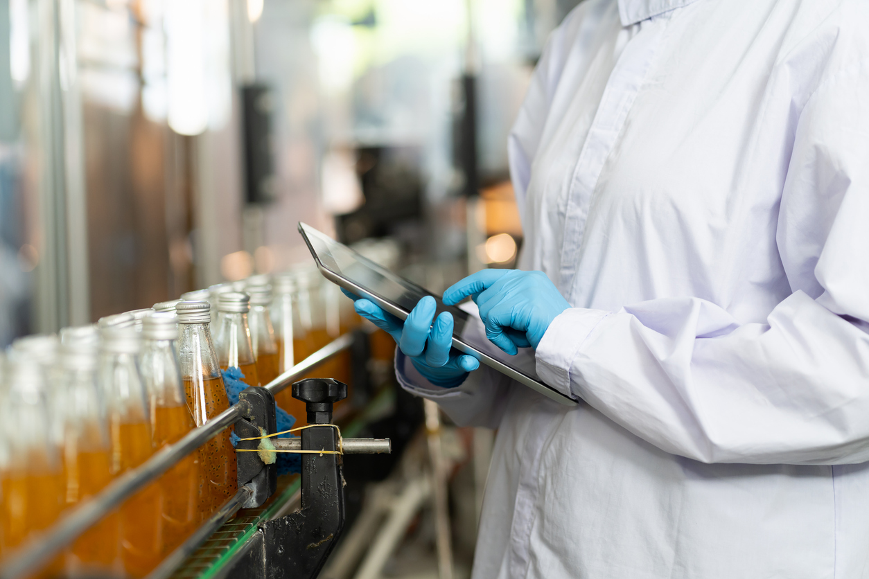food processing industry - A food processing plant with a worker